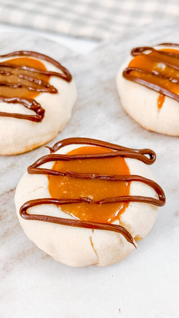 IMG_6690_jpg-576x1024 Twix Thumbprint Cookies