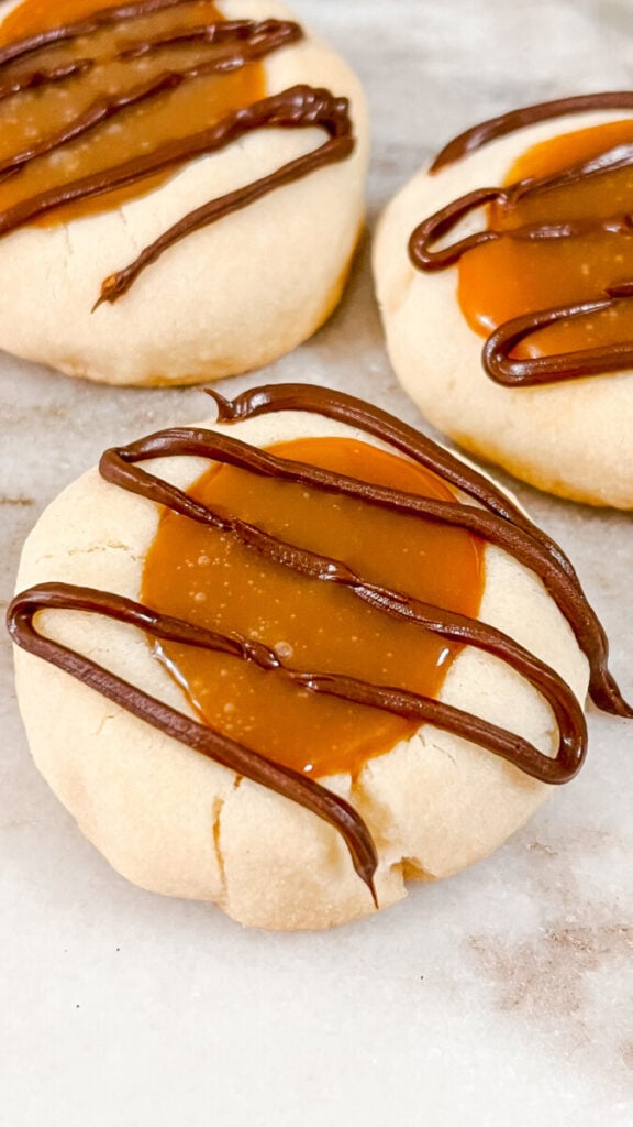 IMG_6707_jpg-1-576x1024 Twix Thumbprint Cookies