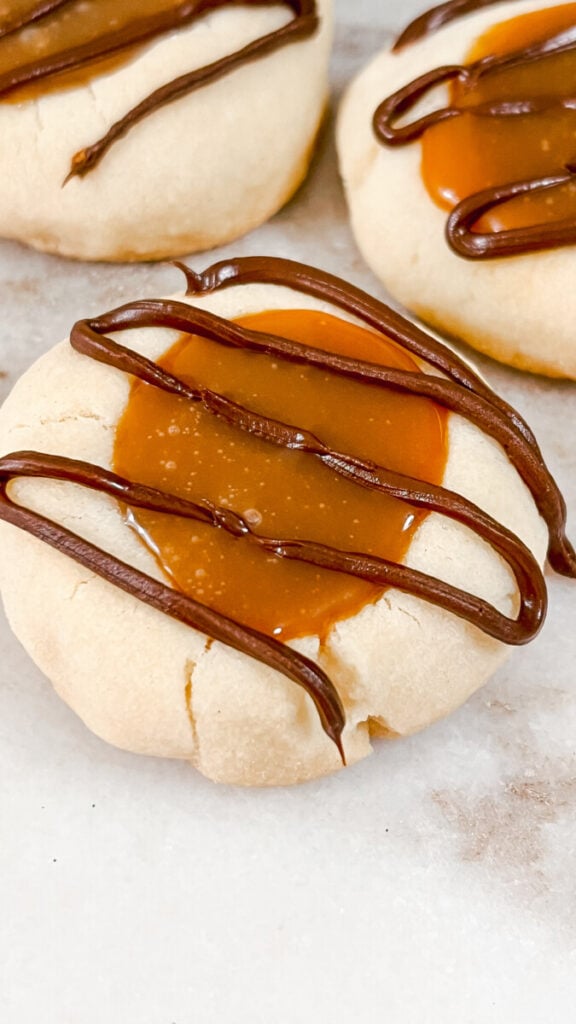 IMG_6708_jpg-2-576x1024 Twix Thumbprint Cookies