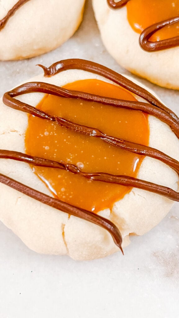 IMG_6710_jpg-576x1024 Twix Thumbprint Cookies