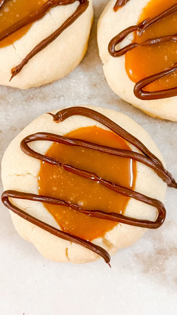 IMG_6711_jpg-1-576x1024 Twix Thumbprint Cookies