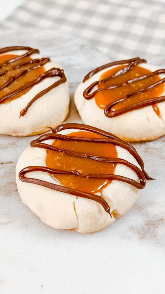 IMG_6712_jpg-1-576x1024 Twix Thumbprint Cookies